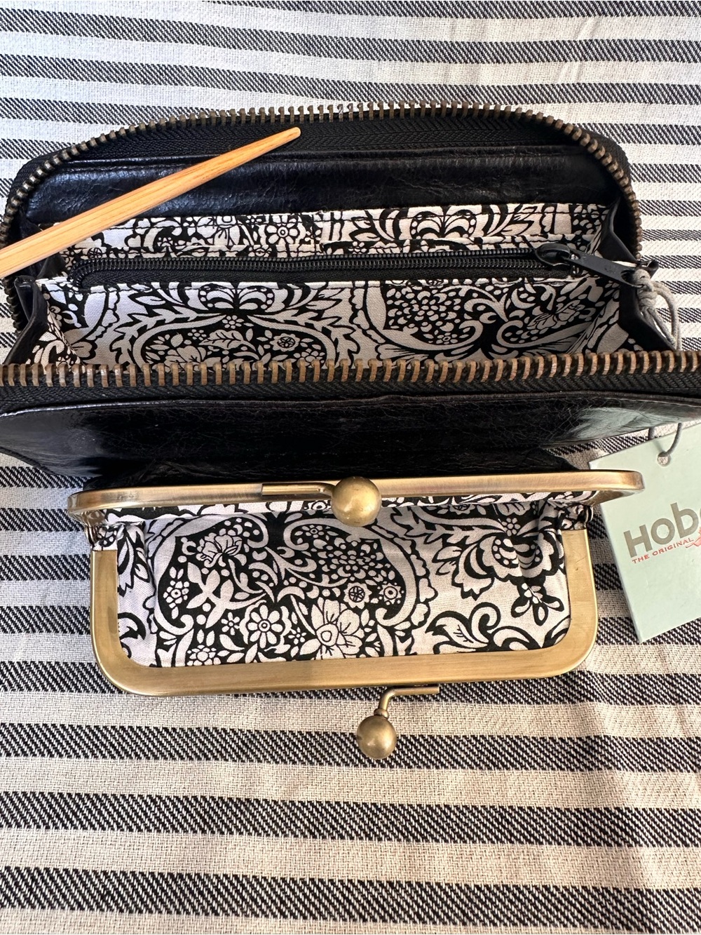 HOBO Black Leather Wallet with Black & White Floral Lining and Brass Hardware